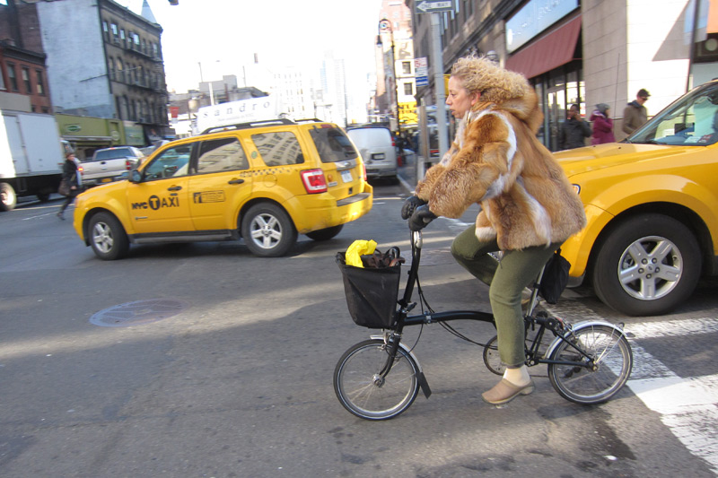 Man & Woman On Bikes